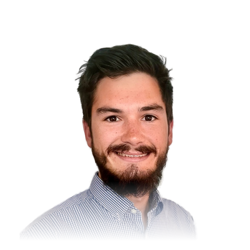 Portrait of Brannon Hogue, smiling, with dark hair, a beard and a checked shirt